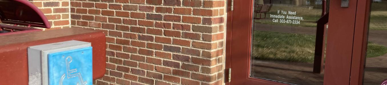 Photo that shows a automatica door opener pad.